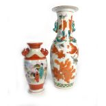 A pair of late 19th/early 20th century Chinese vases of baluster form allover decorated with fancy