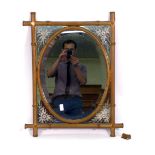 An Aesthetic Movement wall mirror,