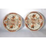 A pair of early 20th century Chinese Export cabinet plates decorated in the Imari palette,