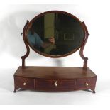 A 19th century mahogany and strung toilet mirror,