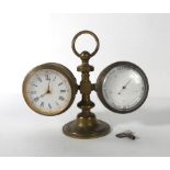 A Victorian gentleman's brass cased desk timepiece and aneroid barometer, h.