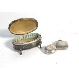 Two silver sovereign cases and a silver oval ring box,