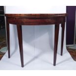 A 19th century mahogany and strung demi-lune tea table on square tapering legs, w.