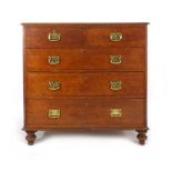 A 19th century oak chest of two short over three long drawers with brass drop handles and turned