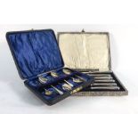 A cased set of six silver old English pattern teaspoons and a cased set of six silver handled