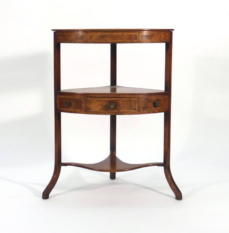 A George III mahogany and inlaid corner washstand, w.