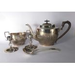 A silver plated three piece tea service by WMF,