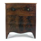 A George III mahogany, strung and bow fronted commode on bracket feet, w.