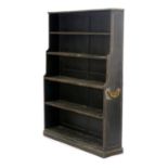 A Victorian black painted and strung open bookcase of waterfall form on a plinth base, w. 108 cm h.