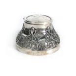 An Edwardian silver mounted inkwell having pierced scrollwork decoration, Henry Matthews,