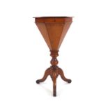 A Victorian walnut work table of trumpet form on a tripod base CONDITION REPORT: Top