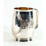 A Victorian silver and parcel gilt Christening mug of ovoid form engraved with foliate motifs and