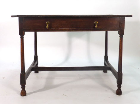 A late 17th/early 18th century oak table,