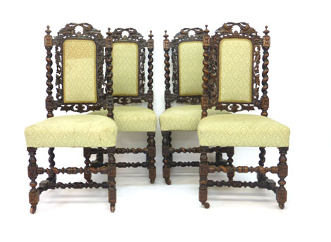 A set of four Victorian oak and upholstered hall chairs with barley twist columns