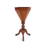 A Victorian walnut work table of trumpet form on a tripod base CONDITION REPORT: Old