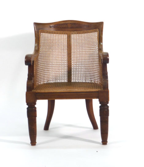 A Victorian mahogany and bergere armchair on turned legs CONDITION REPORT: