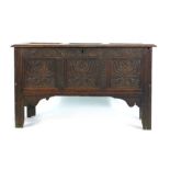 An 18th century and later oak coffer,