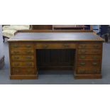 A late Victorian oak desk,