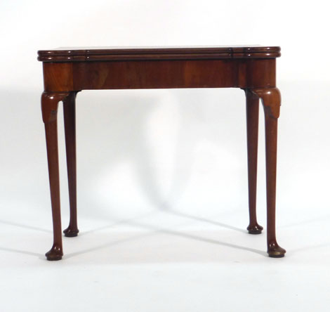 An 18th century and later mahogany card table,