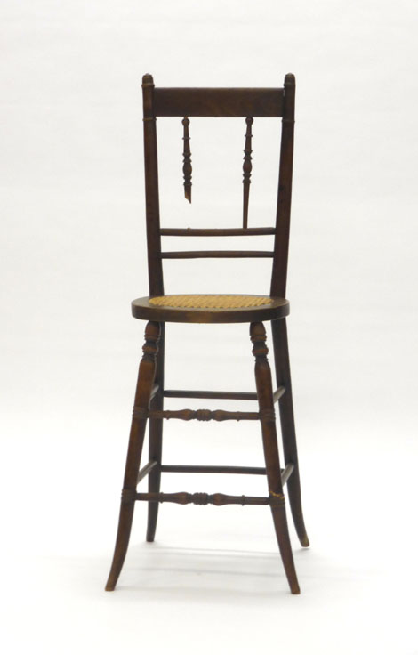 A late 19th/early 20th century beech and bergere child's high chair CONDITION REPORT:
