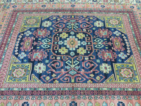 A 1930's woolen rug, - Image 3 of 11