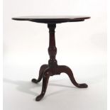 A George III mahogany table, the circular surface on a bird cage mechanism,