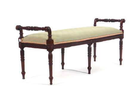 A late 19th-style century mahogany and upholstered window seat on turned legs, l.