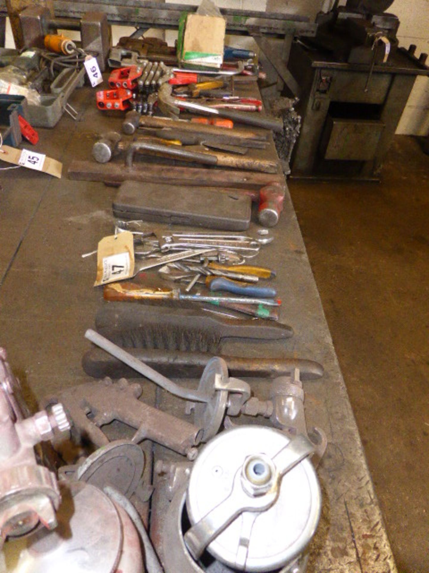 Selection of hand tools, rivet guns, hammers, spanners, etc.