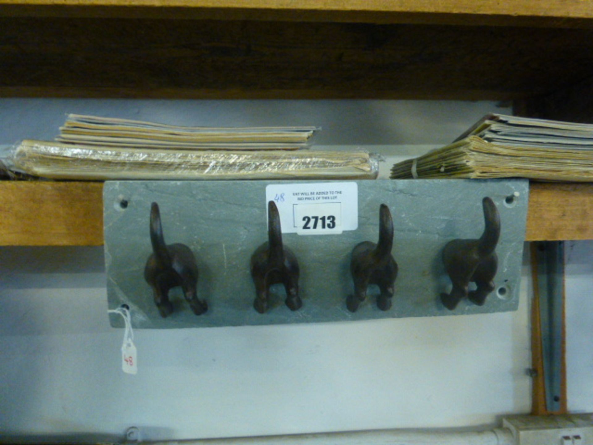 (48) Dog tail hooks on slate base