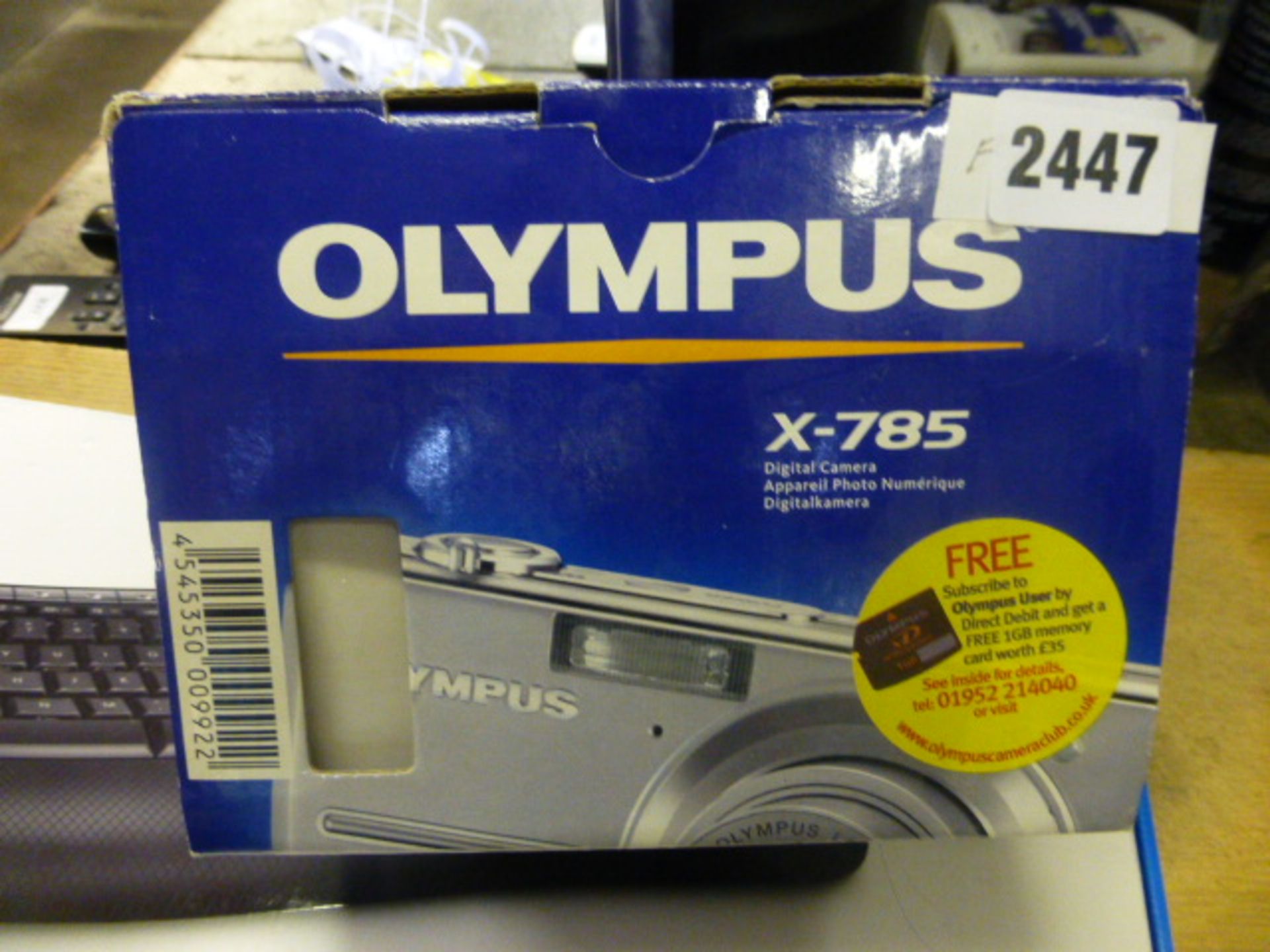 Olympus X785 digital camera in box