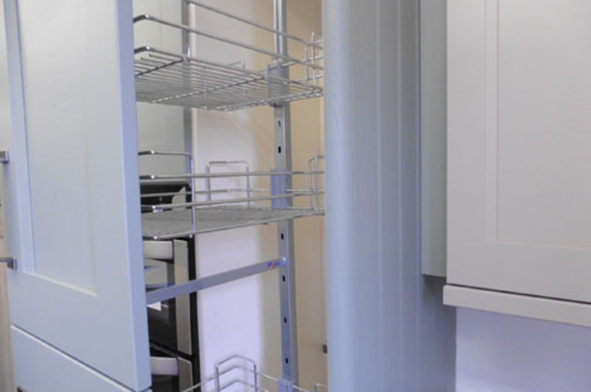 A small kitchen display in olive green finish in a shaker-style, with a pull-out larder cupboard ( - Image 3 of 3