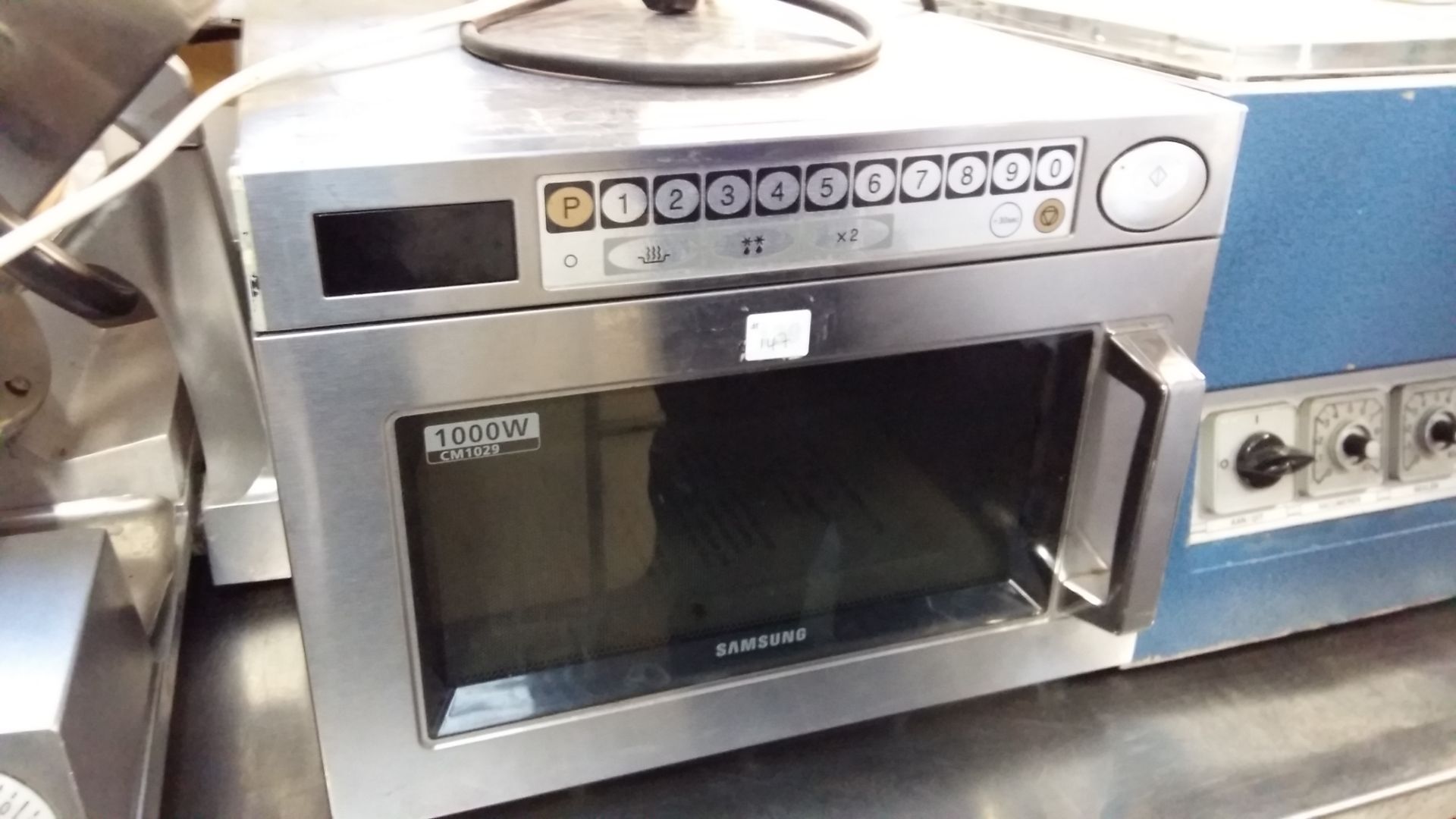 Samsung CM1029 1000w microwave oven