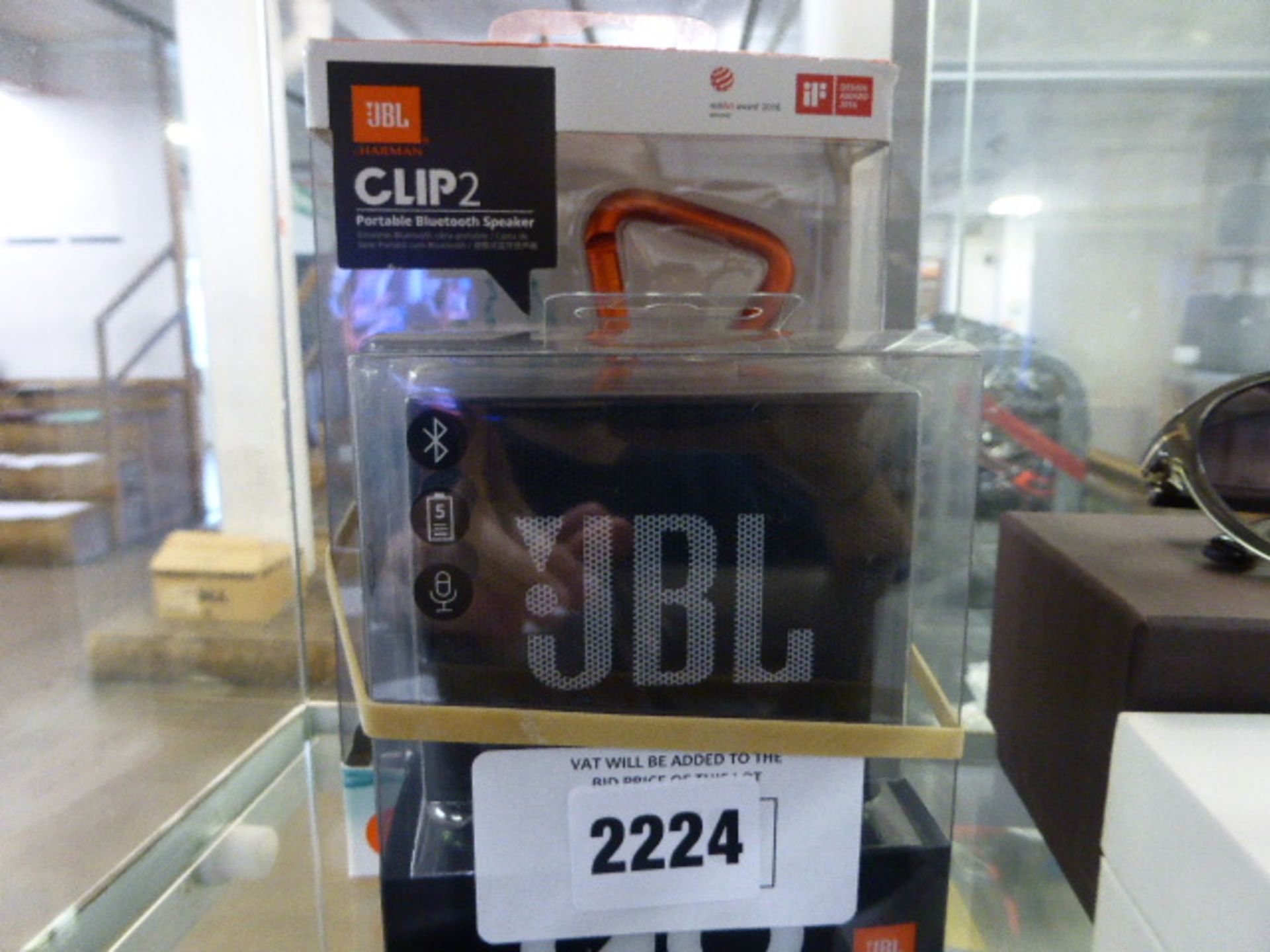 2278 JBL Go portable speaker together with a JBL clip-to speaker