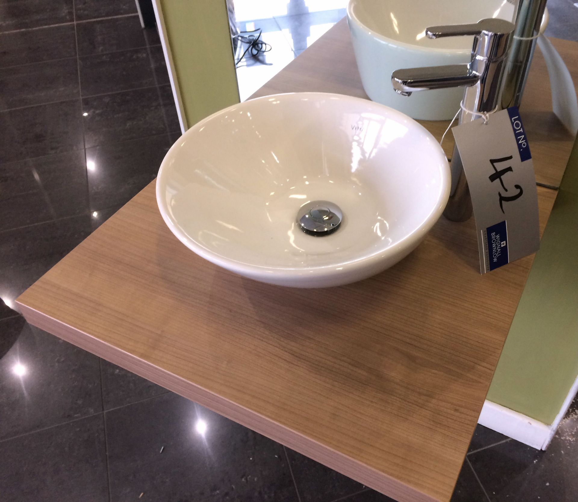 A Bathroom Display comprising Vitra Geo 38cm Round Bowl with Chrome Clicker Waste and Luxor Tall