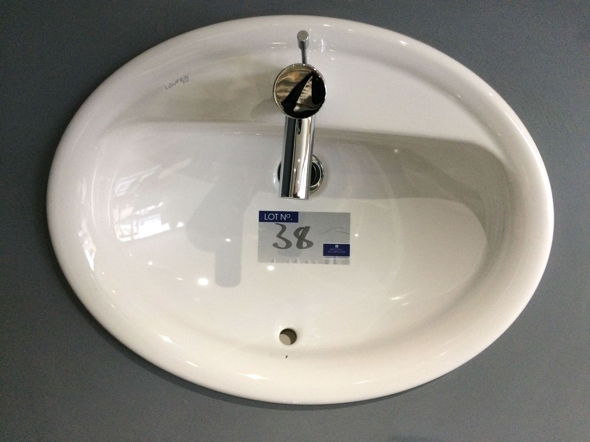 A Laufen Pro Matrix 55cm Under Mounted Wash Basin with Bristan Sigma Chrome Mini Mixer Tap.