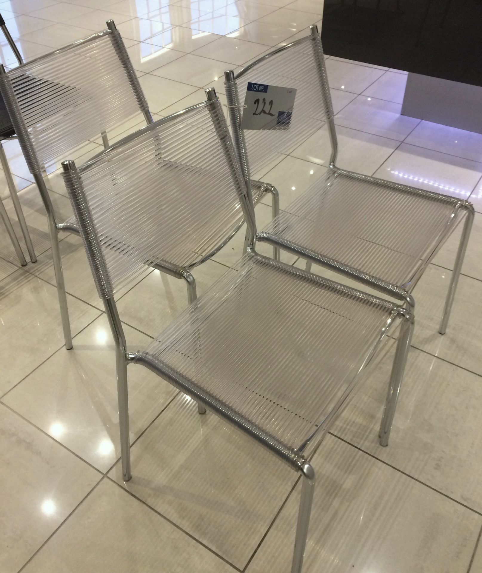 3 Chrome Framed Clear Plastic Rope Dining Chairs.