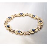 18k Yellow Gold 5.25ct Sapphire, 2.80ct Ruby & 1.40ct Diamond Bracelet