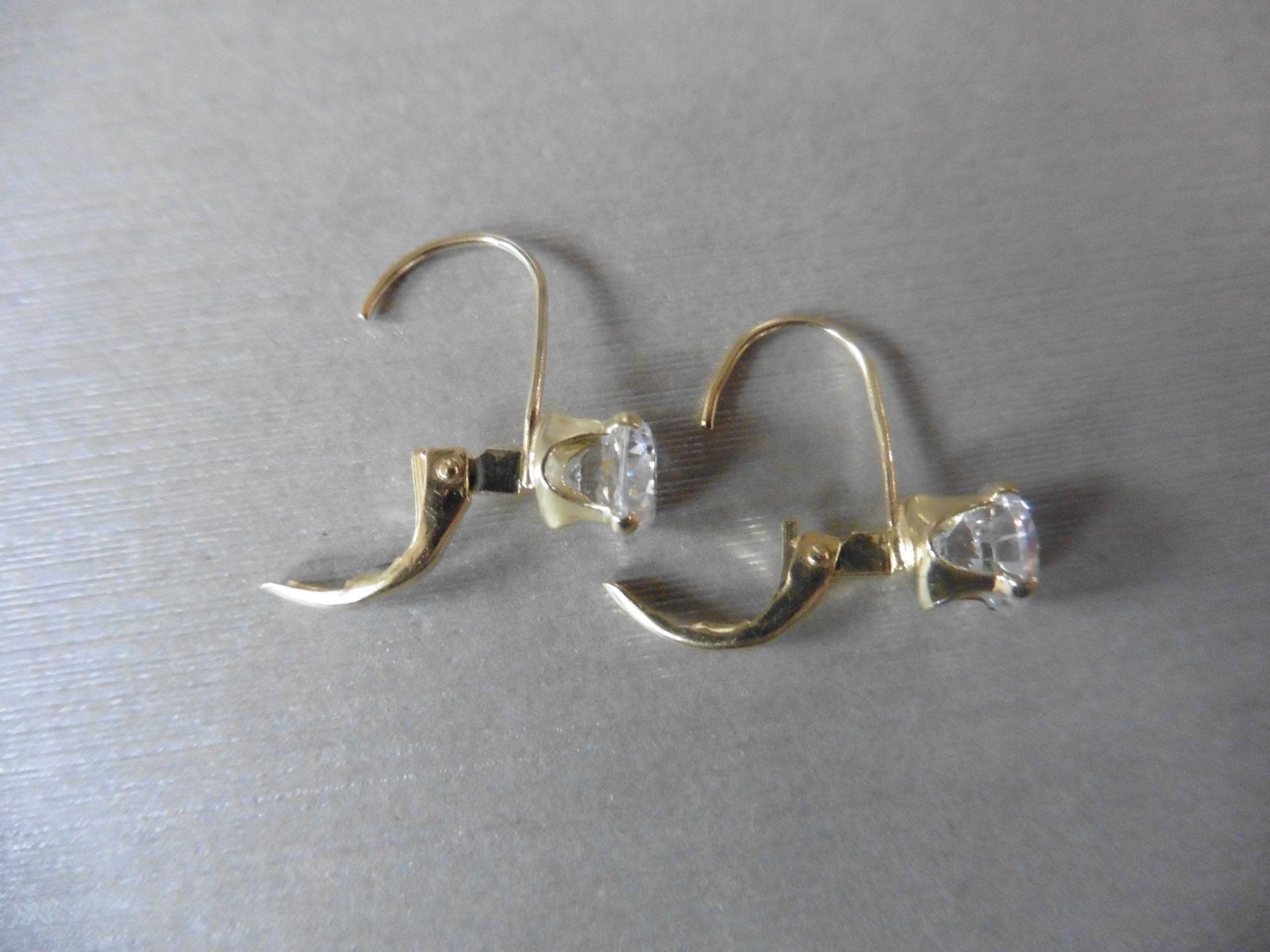 0.80ct diamond hinged style earrings each set with a brilliant cut diamond, I colour,Si2 clarity. - Image 3 of 3