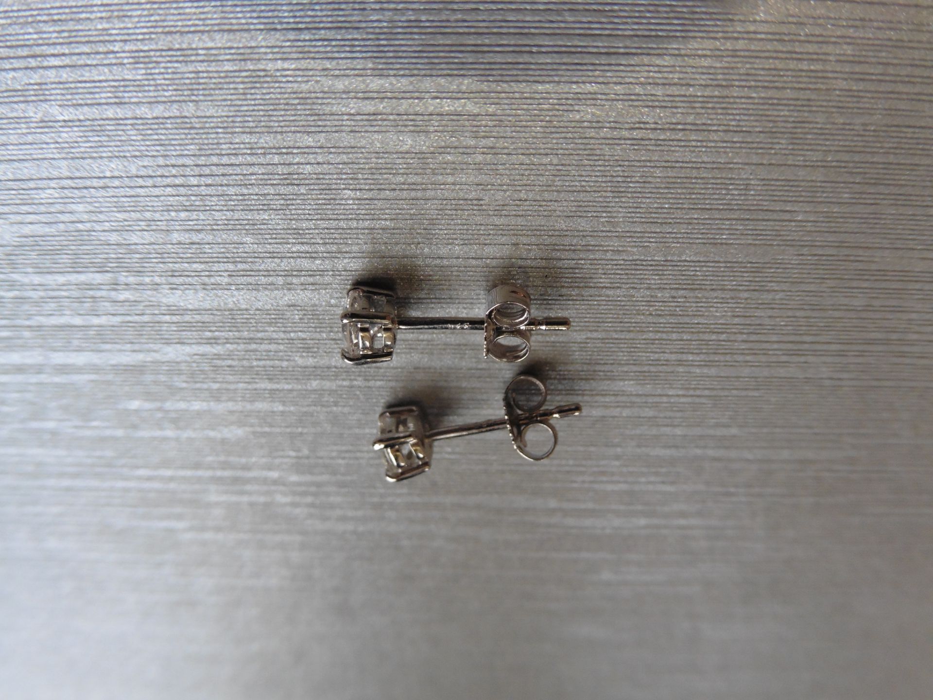 0.50ct Solitaire diamond stud earrings set with brilliant cut diamonds, SI2 clarity and I colour. - Bild 2 aus 2