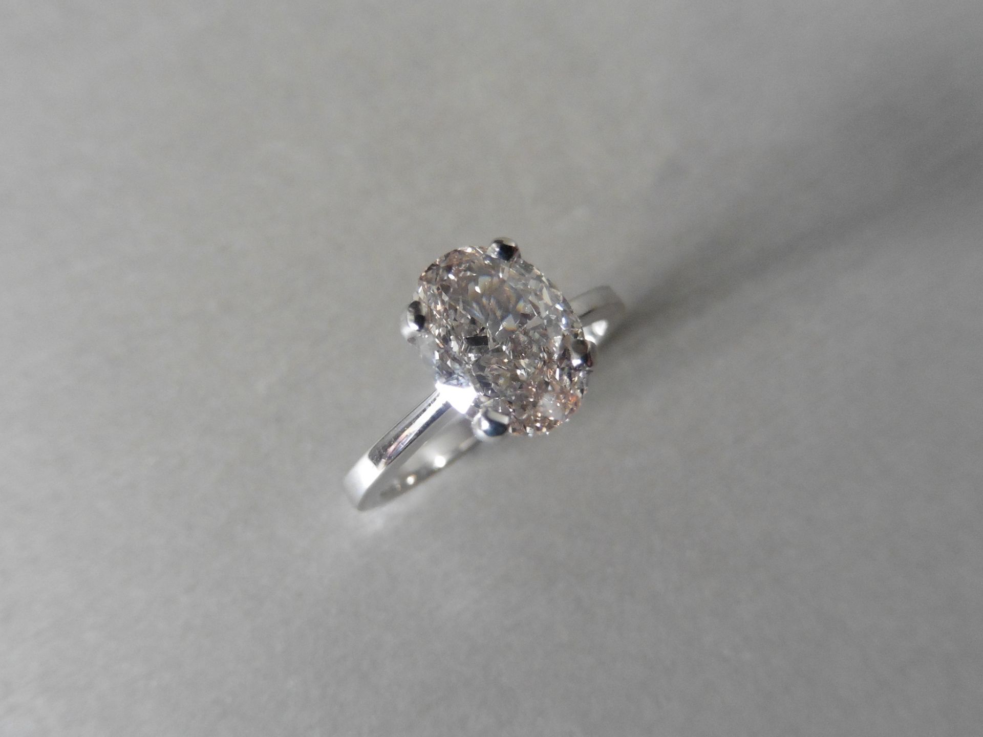 2.21ct oval cut diamond solitaire ring. Set in 18ct white gold, M colour, VS2 clarity. 9.02 x 6.79 x