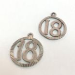 Pair of "18" pendants, one stamped Silver