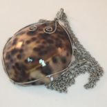 Necklace with pendant made from a shell