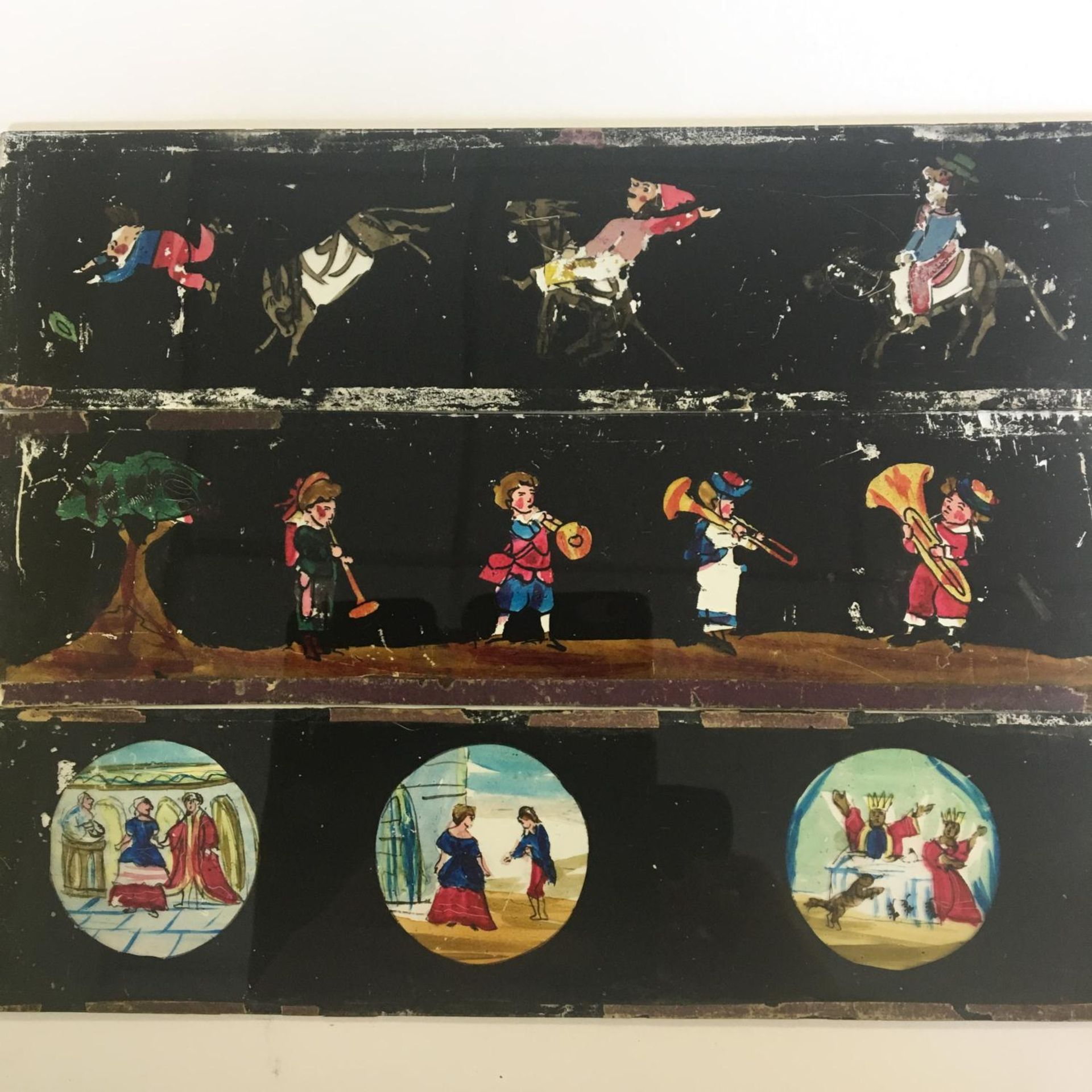 Group of three hand painted antique Magic Lantern slides