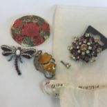 Collection of four costume jewellery brooches. Three are vintage and in very good condition, the