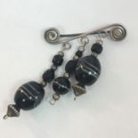 Vintage silver brooch or kilt pin with black stones, stamped 925