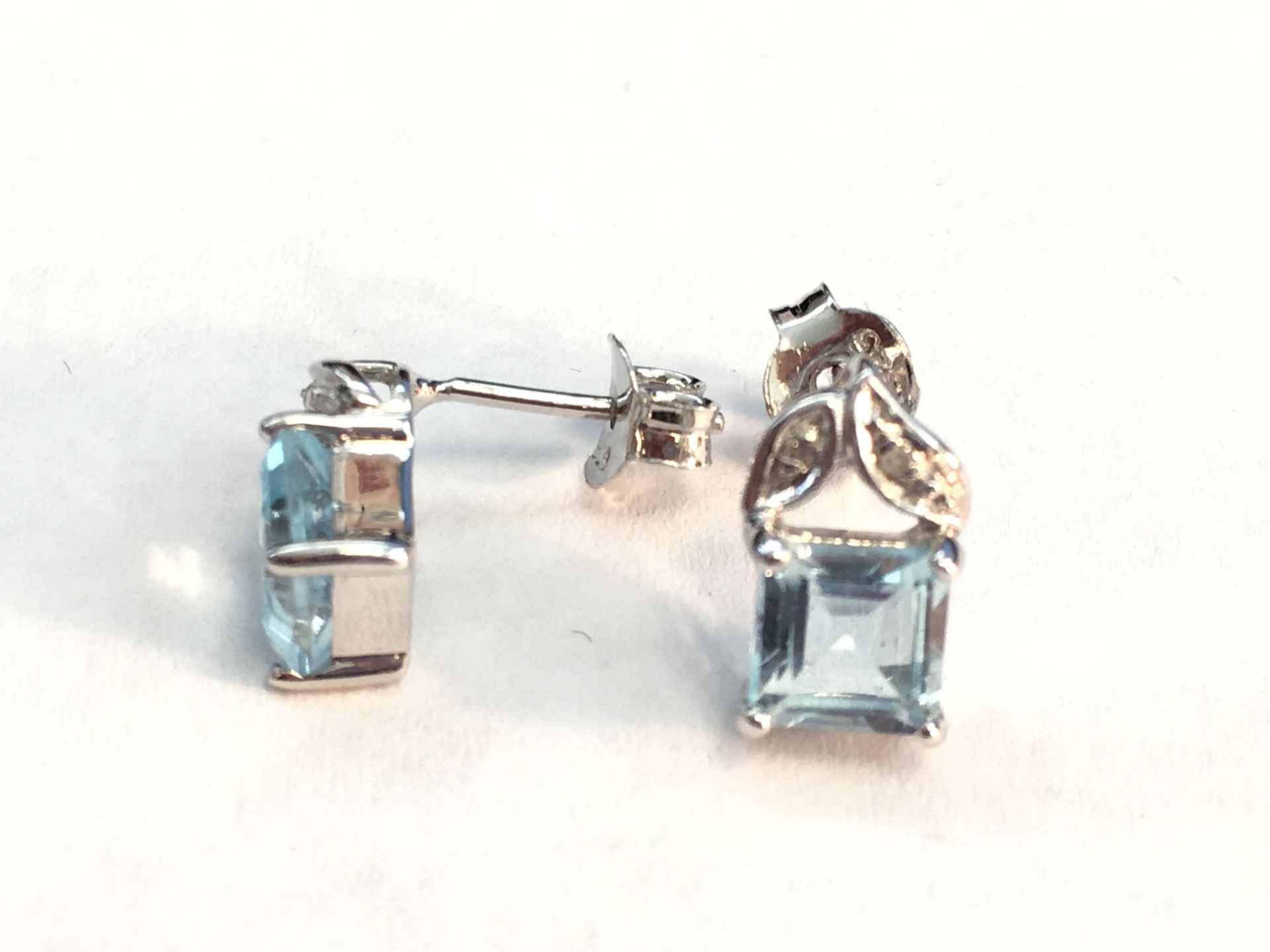 Pair WM (925) Blue Topaz & Diamond Earrings