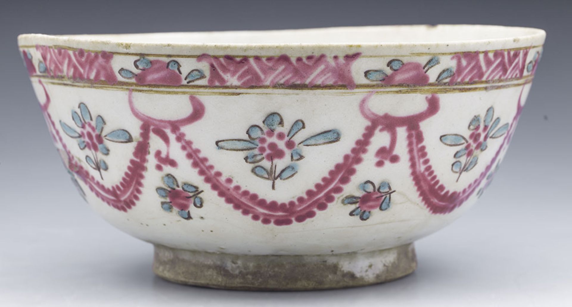 ANTIQUE MIDDLE EASTERN BOWL WITH FLORAL GARLANDS 17/18TH C.