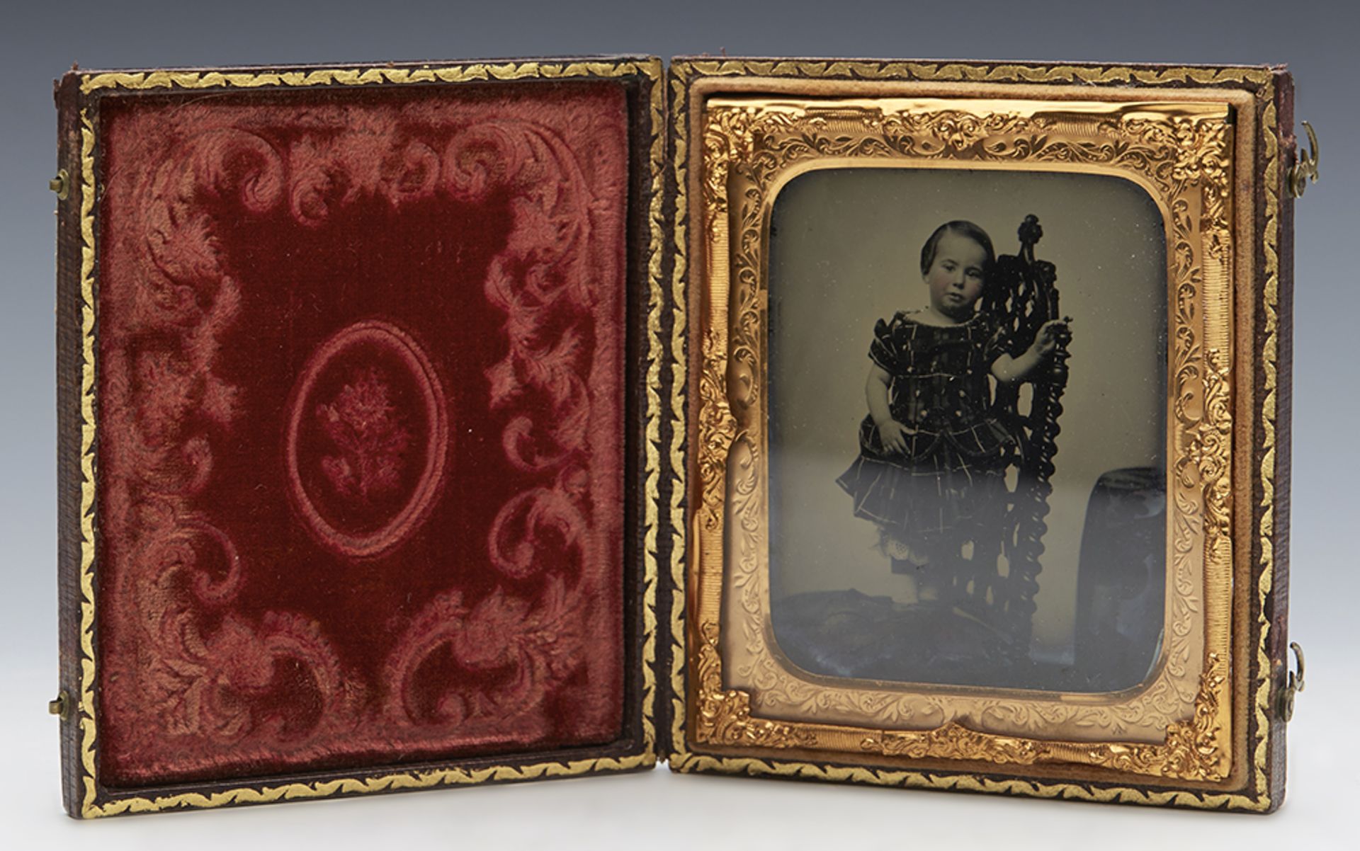 ANTIQUE CASED AMBROTYPE OF A YOUNG GIRL STANDING ON A CHAIR C.1865