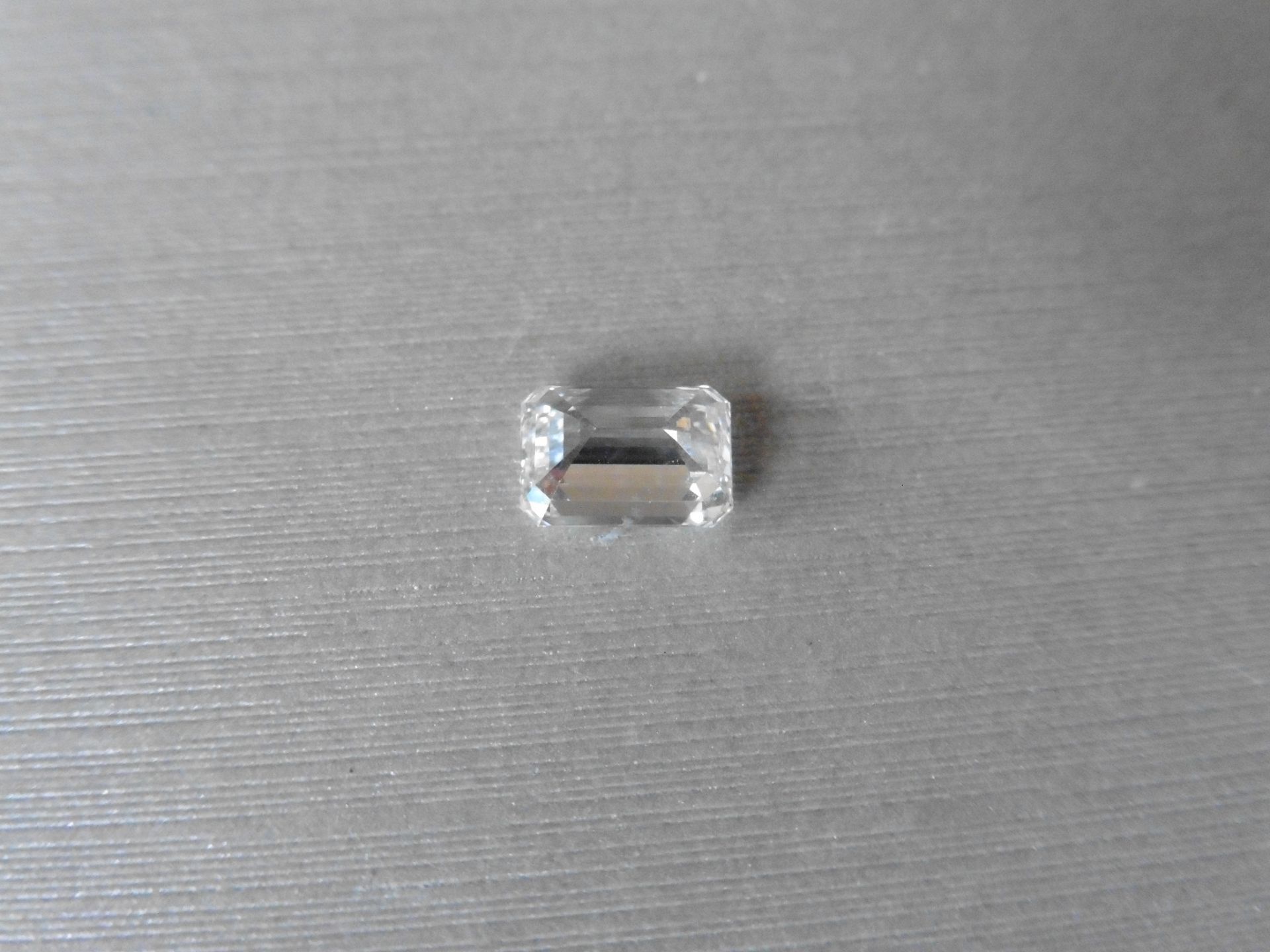1.50ct single emerald cut diamond. Measures 7.67 x 5.41 x 3.53mm. F colour SI2 clarity. - Image 3 of 5