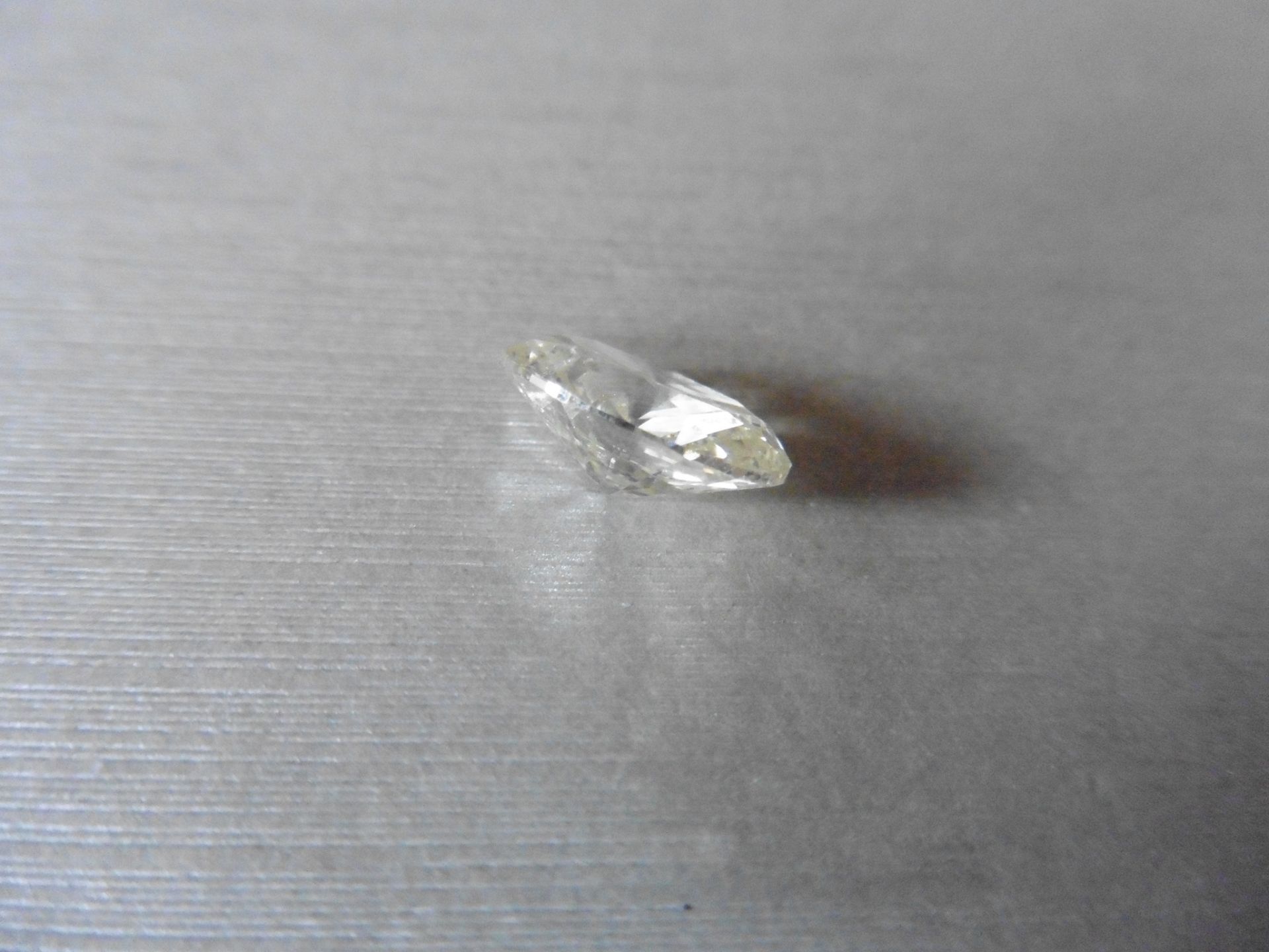 4.41ct single oval cut diamond. Measures 12.66 x 9.38 x 5.40mm. I colour, si3 clarity - Image 2 of 5